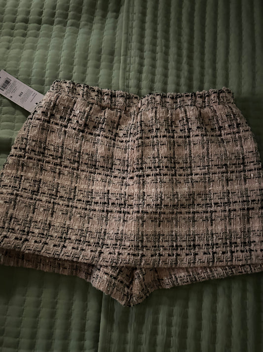 A sophisticated tweed skort