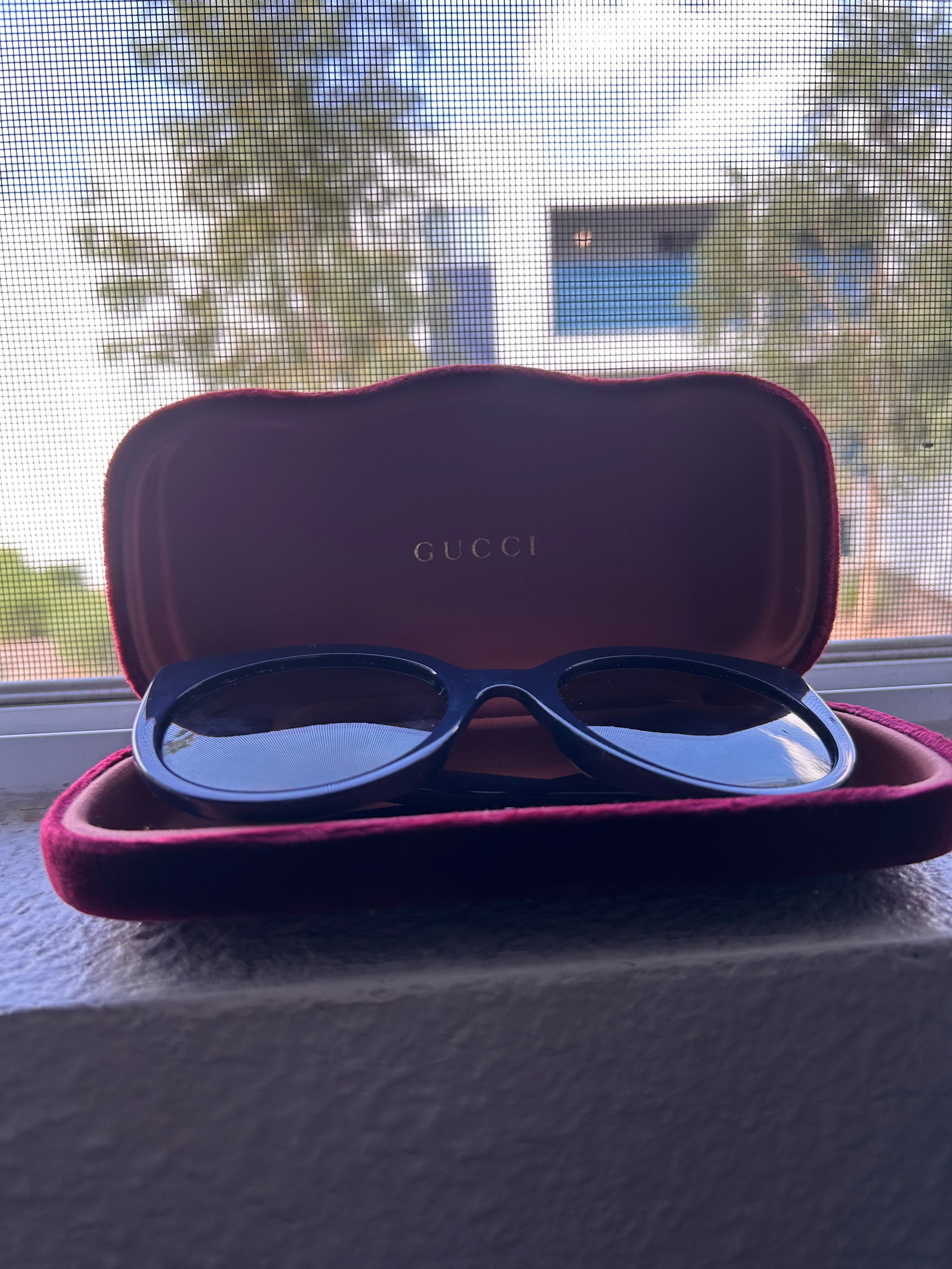 Gucci Black Oval Sunglasses with Velvet Case