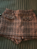 A sophisticated tweed skort